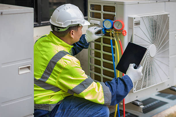 Professional Heat Pump Repair technician working in Newport, DE